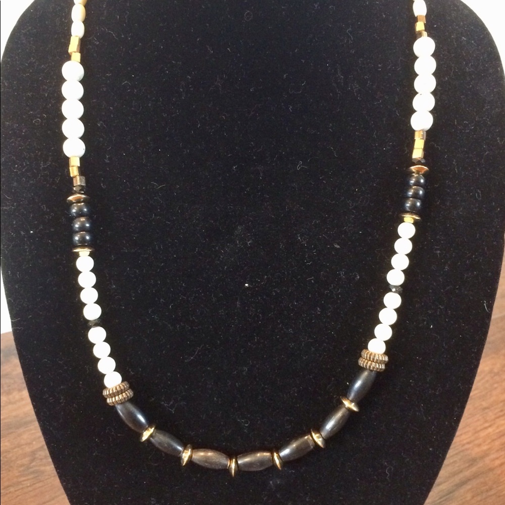 Neutral based necklace.